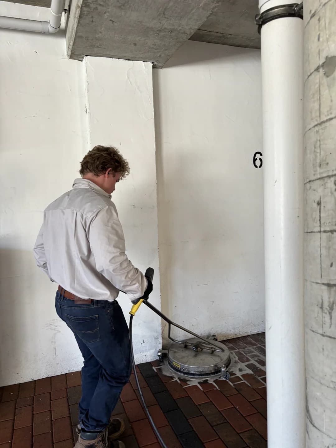 Outdoor patio tiles cleaned, removing years of grime and moss buildup